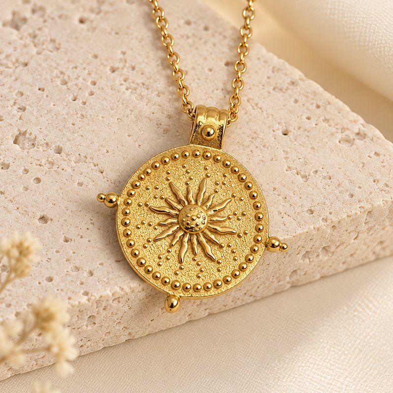 golden sun medallion on travertine
