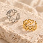 linked heart rings on limestone