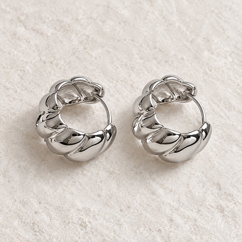 polished gold braided hoop earrings